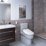 White Brondell Swash 1400 bidet toilet seat installed in a bathroom with the lid closed from a side view