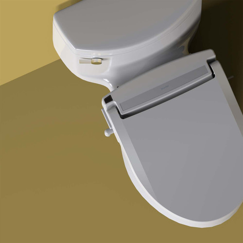 Brondell Swash LT99 bidet toilet seat installed on toilet in front of a yellow background
