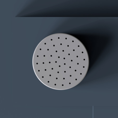 Nebia VivaSpring replacement showerhead filter in front of a blue background