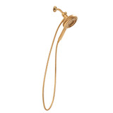 Side view of the Nebia Corre Four-Function Handshower Brushed Gold with a white background
